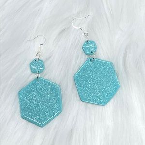 Handmade polymer clay with epoxy earrings.